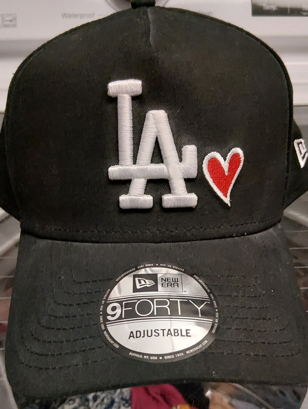 New Era 9/40 Black Trucker LA Cap with Red Heart Accent